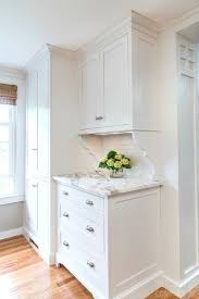 Blissful Cottage Kitchen Cabinetry Woodmode Brookhaven Cabinets With Nordic White Finish Backsplash Kitchen Remodel White Kitchen Remodeling Home Kitchens