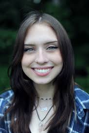 Despite hardship, Marlborough grad found solace in school