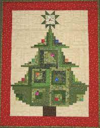 Get the free quilt pattern here. Curved Log Cabin Quilt Cabin