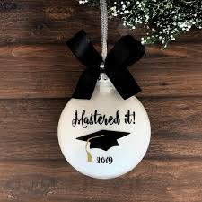 Give them a sentimental keepsake, something useful, or just plain silly. Masters Degree Graduation Gift For Her Graduation Ornament Etsy In 2021 Graduation Ornament Masters Graduation Gifts Graduation Gifts