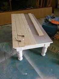 An old window 2 x 4's old paneling* table legs hinges stain or paint (optional) sander and sand paper electric drill bolts washers nail gun* wood glue use tack cloth to pick up small pieces of sawdust. 27 Refurbished Coffee Tables Ideas Redo Furniture Furniture Makeover Furniture Diy