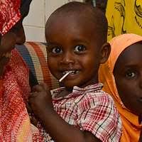 Lt. Sam Lieber interacts with students at Assumption School in Majuro,  Marshall Islands during a during Pacific Partnership 2019 host nation  engagement.