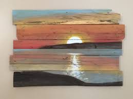 Reapply the paint stripper to detailed or problem areas scrub the entire project with nylon brushes or abrasive pads to remove all traces of the old finish and the stripper sludge. Sunset On Reclaimed Pallet Wood Pallet Art Pallet Painting Wood Art