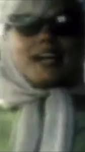 Sandra Giles drives her “mink” covered car.