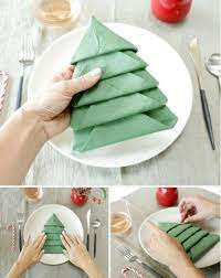 Amazing Folding Technique Turns Your Napkins Into Christmas Trees Diy Crafts Mini Christmas Tree Decorations Christmas Dining Table Christmas Dinner Table