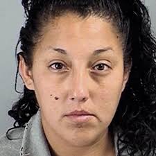 Murderer's wife held for alleged assault