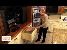 Rather than replacing the cabinets completely, the homeowners is merely improving the old ones installed in their kitchen. Reico Two Deep Drawer With Built In Roll Out Trays Cabinet