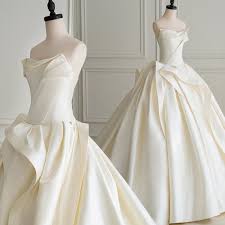 Shop top fashion brands dresses at amazon.com free delivery and returns possible on eligible purchases Ivory Satin Ball Gown Wedding Dress With Pleated Skirt Suknia Slubna Simple Bridal Gowns Strapless Bride Dress Robe De Mariee Sold By Mirusponsa On Storenvy