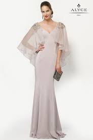 Demand Attention In This Magnificent Evening Gown The Stretch Crepe Floor Length Gown Has A V Neck And A Glamorous Evening Gowns Evening Gowns Evening Dresses