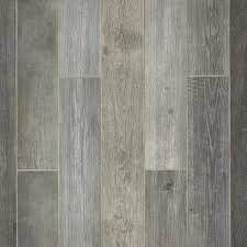 Engineered wood flooring is characterised by a top wear layer of hardwood (like oak or walnut) glued to the softer, more abundant wood's (usually birch, pine or spruce) single ply or multiple layers. Woodhaven Grey Wood Plank Porcelain Tile 6 X 40 100559103 Floor And Decor