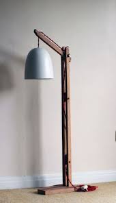 The nester showed us how to make a super simple and chic glass floor lamp. Diy Standing Lamp Wood Google Search Wooden Lamps Design Wooden Floor Lamps Unique Floor Lamps
