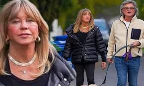 Goldie hawn and kurt russell have been in a romantic partnership for 35 years. Goldie Hawn And Kurt Russell Walk Their Lab Puppy Roy In La After Celebrating 38 Years Together Daily Mail Online