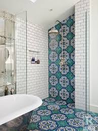 The beige shades of herringbone look just like a wooden floor, but it's all made from tile. 10 Shower Tile Ideas That Make A Splash Bob Vila