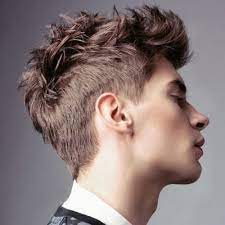A faux hawk (also known as 'the fohawk') is defined by shorter back and sides and longer hair on top. 55 Hottest Faux Hawk Haircuts For Men Men Hairstyles World