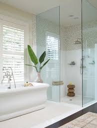 A walk in shower gives your bathroom the illusion of more space due to its open glass doors. Tips For Building A Shower Enclosure For Your Bathroom Remodel Better Homes Gardens