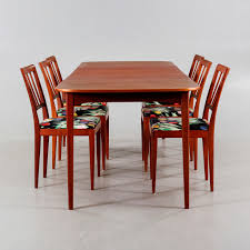a carl malmsten dining table and six