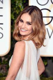 Lily james was born lily chloe ninette thomson in esher, surrey, to ninette (mantle), an actress, and jamie thomson, an actor and musician. Lili Dzhejms Disney Wiki Fandom
