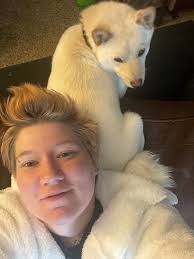 Shiba Inu squint and smile behavior?