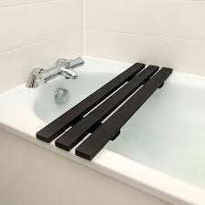 Enjoying a relaxing soak in the bathtub is something most of us take for granted, however, for people who have certain disabilities, mobility problems or elderly, getting in and out of a standard bath can be difficult. Grid Black Over The Bath Tube Rack The Bath Rack