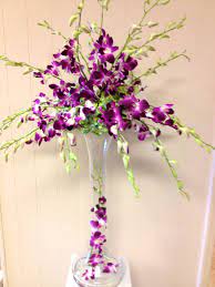 Pin By Jacqueline S Flowers Gifts On Wedding Reception Centerpieces Purple Wedding Centerpieces Wedding Floral Centerpieces Orchid Centerpieces Wedding