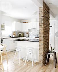Notice how the plants contrast nicely with the white backdrop. 95 Stylish Kitchens With Brick Walls And Ceilings Digsdigs
