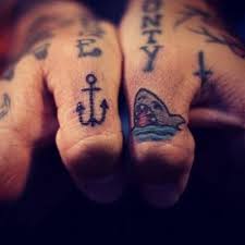 Tribal runes tattoos on four. 23 Stunning Small Finger Tattoos For Men Styleoholic