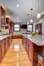 White granite countertops with light wood cabinets. Viscont White Granite Countertops With Cherry Cabinets Contemporary Kitchen Boston By Stone Projects Houzz