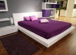 For a contemporary bedroom, wall lights in an interesting but classic shape, like torches, can look great. Modern Bedroom Design With Unusual Wall Shelves Digsdigs