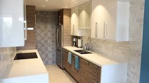 The open shelf theme is continued offering additional storage and a second sink is cleverly set. Ikea Kitchen Remodel Brokhult Ringhult High Gloss White Ikea Kitchen Youtube