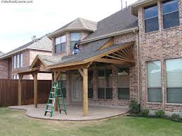 This porch is a great example of how just a few wood beams can create a much more custom look on a house compared to a standard peak. Make It A Functional And Decorative Patio Roof In Your Design Decorifusta Patio Roof Ideas Patio Design Porch Roof Styles