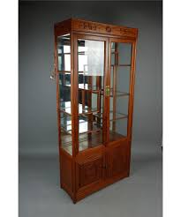 Maybe you would like to learn more about one of these? 1940s Rosewood Curio Cabinet W Glass Doors
