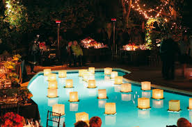 Floating Lotus Candles For Pool Wedding Set Elegant Floating Lanterns Surrounded By Moss In The W Pool Wedding Decorations Pool Wedding Backyard Wedding Pool