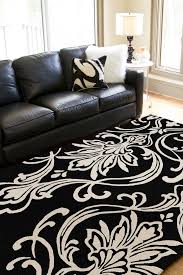 Modern Black And White Rug Living Room Top 10 Black And White Rug Ideas To Demand The Attention Of A Room Http Blog Plushrugs Com Top 10 Blac Black White Rug Black And White Decor Modern Classic