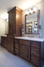 Knotty Alder Vanity With A Large Linen Tower Dual Sinks And White Quartz Countertops Farmhouse Bathroom Vanity Bathrooms Remodel Bathroom Remodel Master