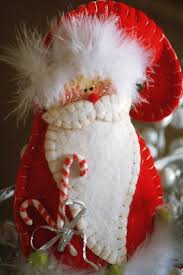 How Sweet Is This Santa Ornament Made From Felt Free Pattern Included Felt Crafts Christmas Felt Christmas Ornaments Felt Ornaments Patterns