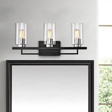 The brushed shades reflect the charm, while the finish inside enhances the brightness of the light. Snediker 3 Light Dimmable Matte Black Brushed Nickel Vanity Light Black Vanity Light Black Light Fixture Beveled Glass