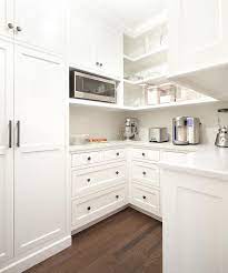 It is a great design to be adapted in confined spaces because it makes use of space in the best way possible. U Shaped Kitchen Pantry With Microwave Nook Transitional Kitchen