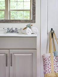 We gave our oak bathroom vanity cabinets a makeover with annie sloan chalk paint in country gray, added some distressing and dark wax. Updating A Bathroom Vanity Hgtv