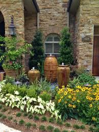 Very large planters are perfect if you want your plants to stand out in your garden this year. 20 Ideas For Using Large Garden Containers Hgtv