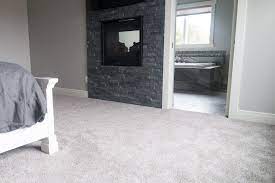 Light Gray Bedroom Carpet With Dark Gray Natural Stone Fireplace Light Gray Carpet Grey Carpet Living Room Carpet
