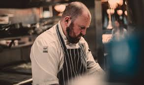 Checkered chef's pants, clean and wrinkle free. What Should Chefs Wear In A Kitchen The Shoes For Crews Checklist