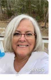 What hair style suits a 62 year old woman with silver hair and thinning  regrowth?