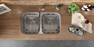 Our commercial grade sinks are the correct choice for your project as they are: 29 Inch Undermount 50 50 Double Bowl 16 Gauge Stainless Steel Kitchen Sink Ruvati Usa