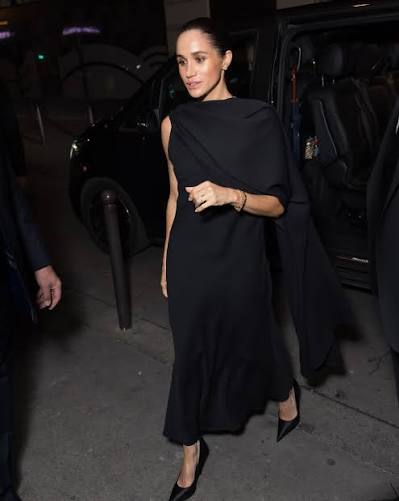 Meghan Markle made a surprise appearance at the Balenciaga show during  Paris Fashion Week, attending the event as part of a solo trip to Europe.  She wore an elegant all-white ensemble followed