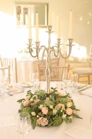 Candelabra centerpieces are gaining new popularity at weddings, receptions, birthdays, and other gatherings. Candelabra Wedding Centerpieces Candelabra Wedding Centerpieces Candelabra Wedding Candelabra Centerpiece