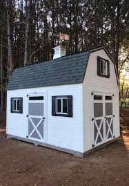 Black And White Barn Style House Get Organized Before Gardening Season Tuff Shed Farmhouse Sheds Shed Large Sheds
