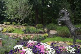 Landscape design, installation of plants and trees, maintenance, landscape lighting, patios, walkways, decks,driveways, retaining walls, ponds, fountains swimming pools and waterfalls. Parking Pad Reno Brick Retaining Wall Stone Retaining Wall Traditional Landscape Baltimore By Tdh Landscaping Houzz