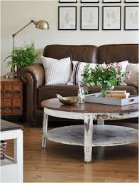 Patterned swiel/leather black corner sofas + matching footstools. Decorating Around A Leather Sofa Centsational Style