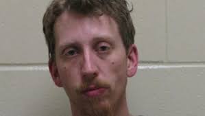 Freeport man accused of killing parents arrested near Lincoln