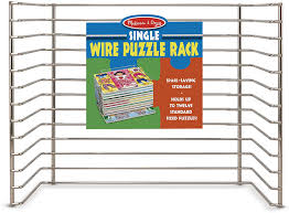 Pull everything out and bring it into one area. Amazon Com Melissa Doug Puzzle Storage Rack Wire Rack Holds 12 Puzzles Melissa Doug 1018 Toys Games